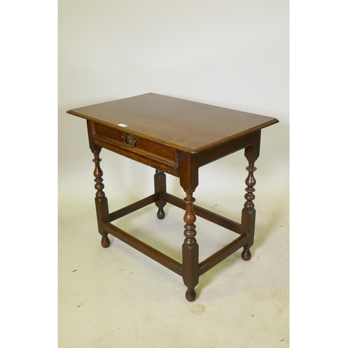 1149 - A William and Mary oak single drawer side table, raised on turned supports, united by stretchers, c.... 