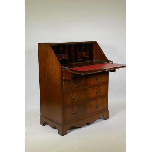 1173 - A Georgian style figured mahogany bureau, with fall front and fitted interior with inset leather fla... 