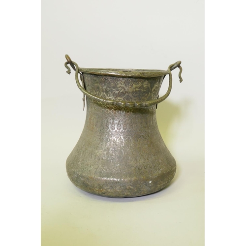 121 - A middle eastern silvered copper pot with chased decoration, 33cm high