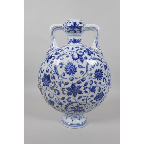 123 - A Chinese blue and white porcelain two handled garlic head shaped flask, with scrolling floral decor... 