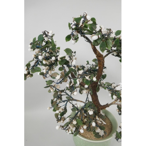 126 - A Chinese celadon glazed porcelain planter with imitation hardstone miniature tree, 45cm high