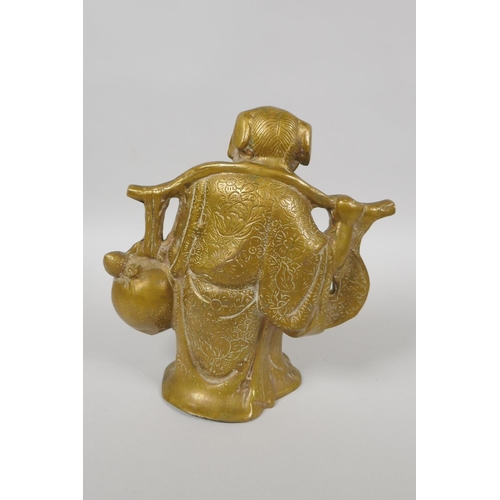 133 - A Chinese brass figure symbolising wealth and health, 19cm high