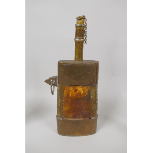 134 - An eastern brass mounted horn powder flask, a white metal mounted water sprinkler, a brass paper kni... 