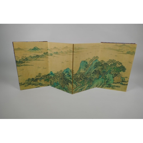 135 - A Chinese printed watercolour concertina book depicting an extensive riverside landscape scene, 18 x... 