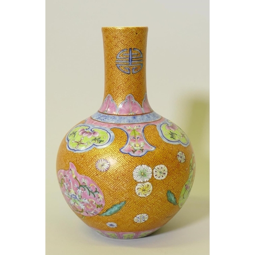 139 - A Chinese lustre glazed vase with enamel decoration, Qianlong seal mark to base, 28cm high