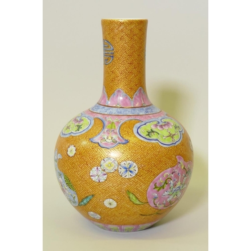 139 - A Chinese lustre glazed vase with enamel decoration, Qianlong seal mark to base, 28cm high