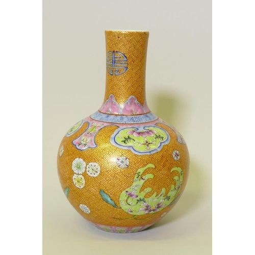 139 - A Chinese lustre glazed vase with enamel decoration, Qianlong seal mark to base, 28cm high