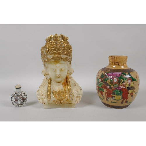 145 - A Chinese carved white hardstone bust of Guan Yin with  gilt highlights, 20cm high, a Peking gl... 