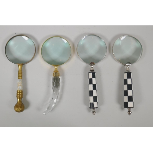 146 - Four magnifying glasses with brass, glass and checkerboard style handles, 26cm