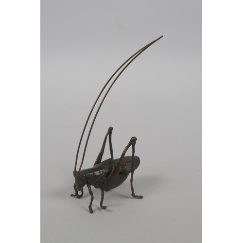 147 - A Japanese style bronze okimono figure of a true katydid insect, 8cm