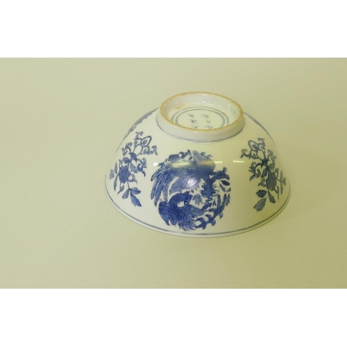 149 - A Chinese blue and white bowl with phoenix decoration, 15.5cm diameter