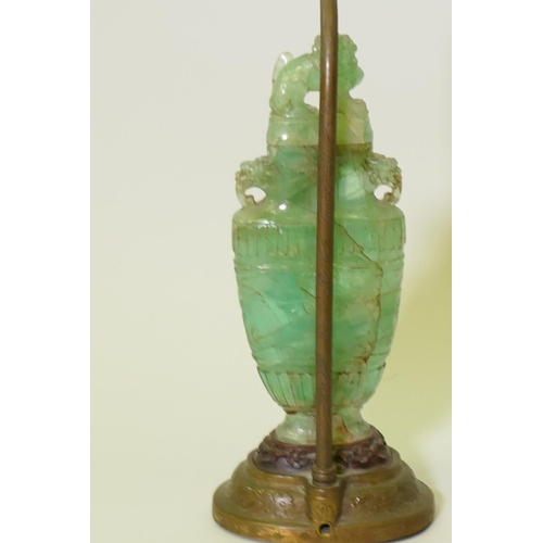 151 - A Chinese carved crystal koro and cover, mounted on a bronze base and converted to a table lamp, 40c... 