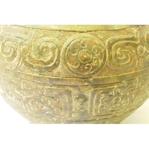 155 - A Chinese bronze vessel with chain handles and archaic style decoration, 20cm high