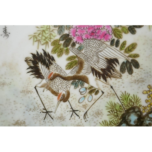 158 - A Chinese famille verte porcelain cabinet plate depicting red crested cranes, character inscription ... 