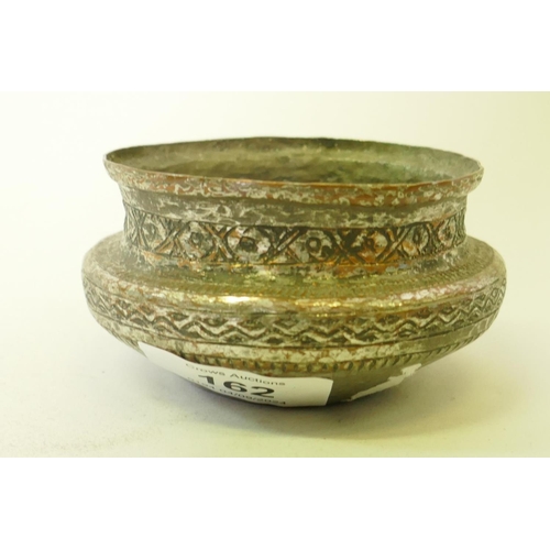 162 - A middle eastern silvered copper bowl, 10cm diameter