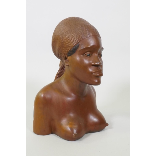 17 - A Haitian carved and painted wood bust of a female, signed to base, Pian Charles, Haiti, 30cm high