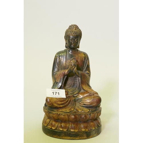 171 - A painted and gilt bronze figure of Buddha, seated upon a lotus throne, 22cm high