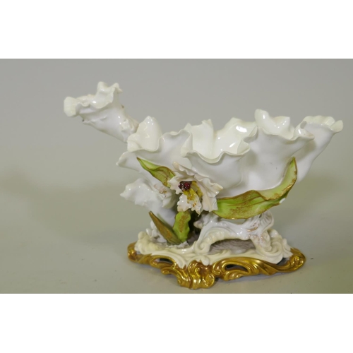 172 - A C19th Moore & Co porcelain centrepiece of naturalistic form with gilt highlights, impressed RD... 