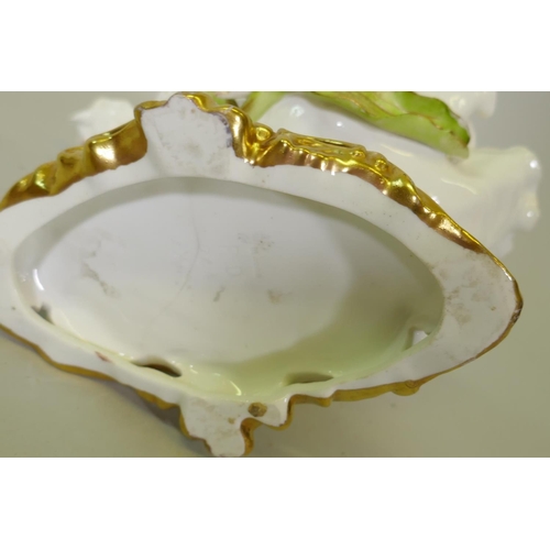 172 - A C19th Moore & Co porcelain centrepiece of naturalistic form with gilt highlights, impressed RD... 