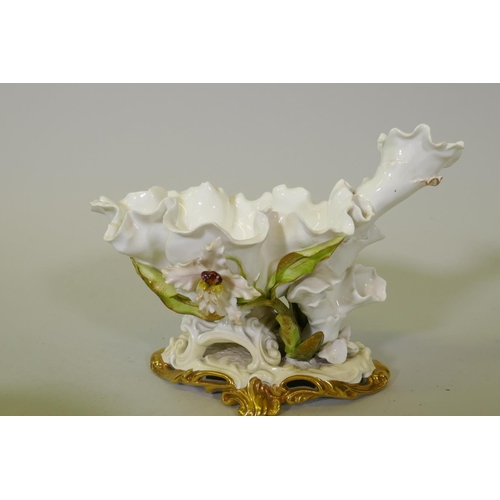 172 - A C19th Moore & Co porcelain centrepiece of naturalistic form with gilt highlights, impressed RD... 