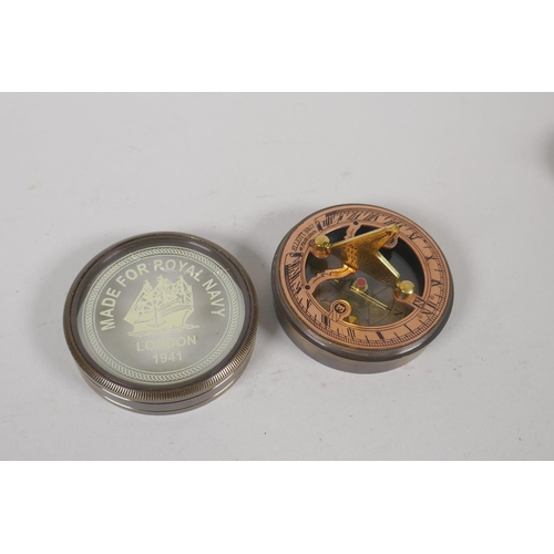 194 - Three brass compasses and a set of three nesting brass drug boxes, largest 12 x 8cm