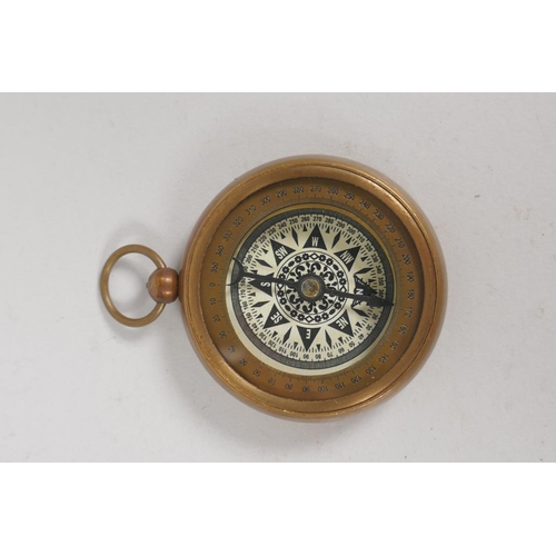 194 - Three brass compasses and a set of three nesting brass drug boxes, largest 12 x 8cm