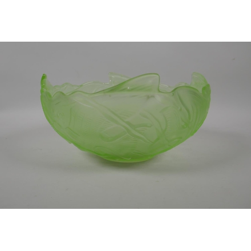 196 - A Lalique style green glass bowl with raised decoration of exotic fish, 24cm diameter