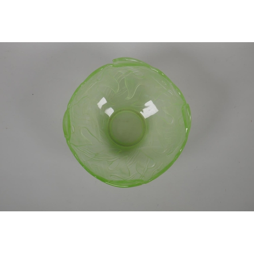 196 - A Lalique style green glass bowl with raised decoration of exotic fish, 24cm diameter