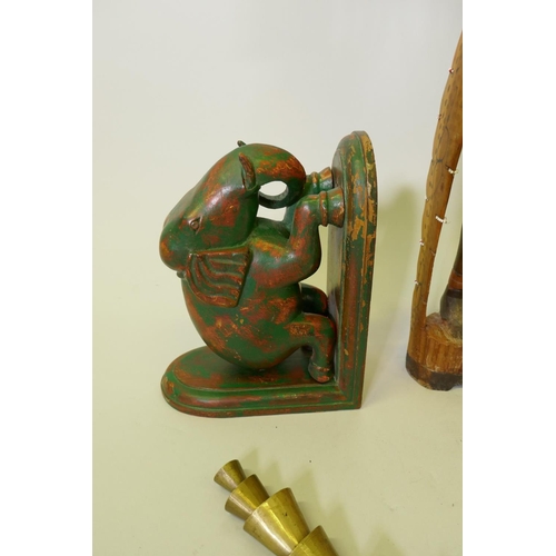 198 - A pair of African carved wood Massi figures, a pair of carved and painted wood elephant bookends and... 