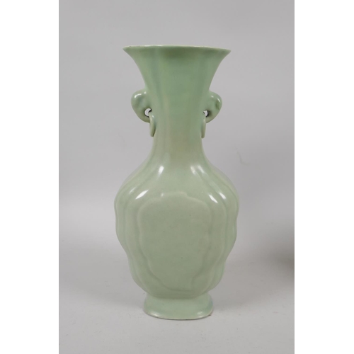 201 - An antique Chinese celadon glazed porcelain vase with two elephant mask handles, AF restored, and a ... 