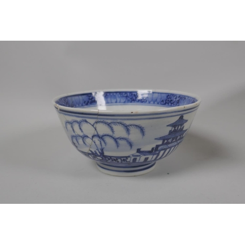 204 - A Chinese C19th blue and white porcelain rice bowl with landscape decoration and KangXi mark, a fami... 