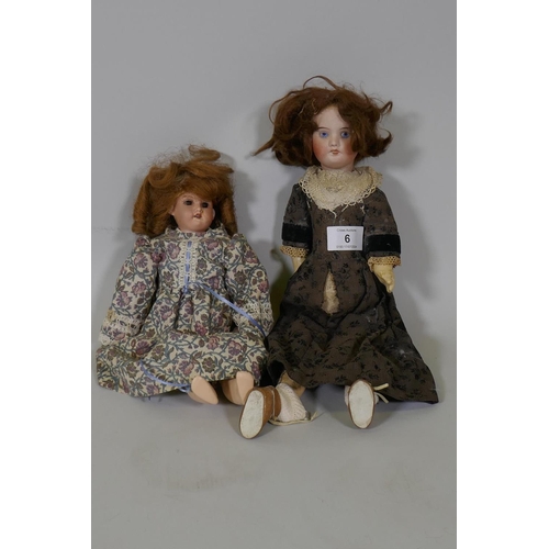 207 - Four porcelain head dolls, an Armand Marseille 991 doll with rolling eyes and open mouth, compositio... 