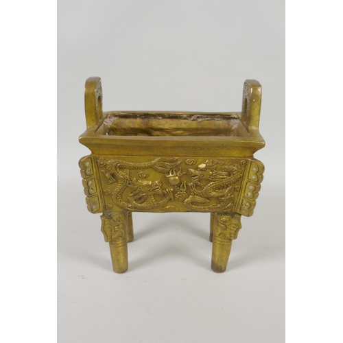 208 - A Chinese gilt metal two handled censer with raised dragon and flaming pearl decoration, 16cm high