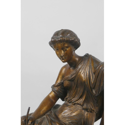 21 - A C19th/early C20th gilt bronze figure of a female scholar on a marble base, 29cm high