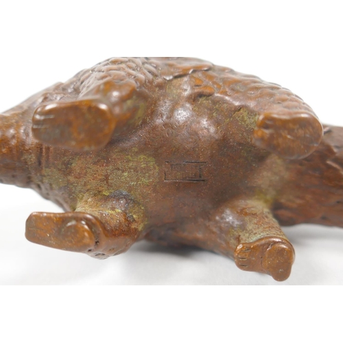 210 - An Oriental miniature bronze figure of a pangolin, 10cm 