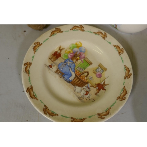 217 - A vintage stuffed plush toy dog with swivel head and a Merrythought dog, Bunnykins mug and plate, So... 