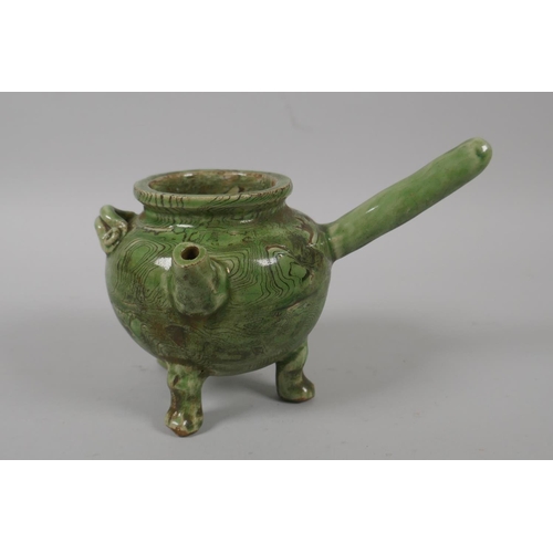 223 - An Oriental green glazed marbled pottery water dropper, 15cm