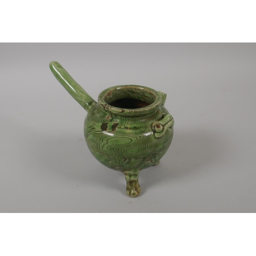 223 - An Oriental green glazed marbled pottery water dropper, 15cm