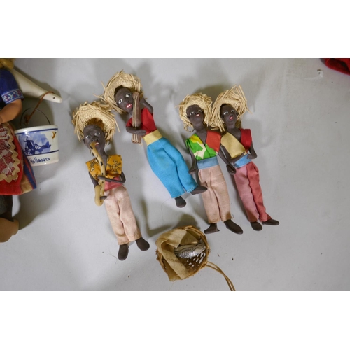 224 - A collection of antique dolls, Dutch, French, Scandinavian, including three Indian women in saris