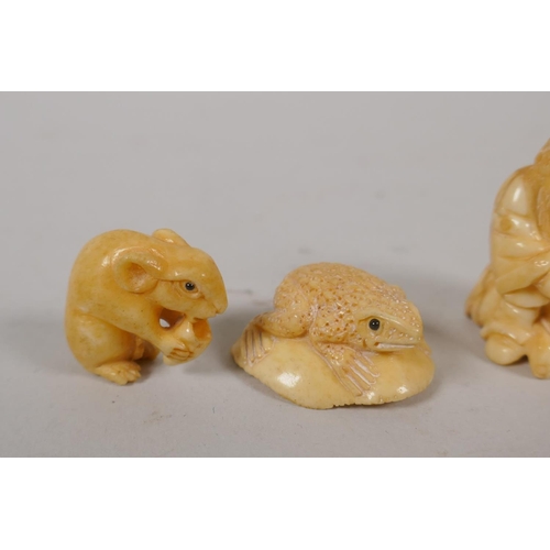 238 - Five Japanese carved bone netsuke in the form of a sage, puppy, toad and rats, one signed, largest 3... 