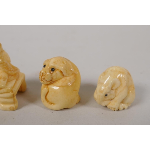 238 - Five Japanese carved bone netsuke in the form of a sage, puppy, toad and rats, one signed, largest 3... 