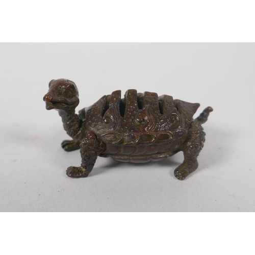 239 - An Oriental bronze censer in the form of a tortoise, marks to base, 6cm long