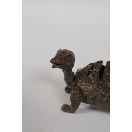 239 - An Oriental bronze censer in the form of a tortoise, marks to base, 6cm long