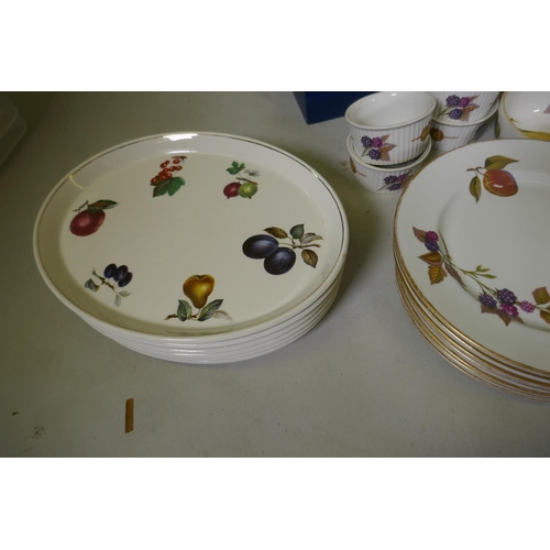 249 - A Royal Worcester Evesham pattern part dinner/tea service and twelve associated Royal Tudor ware pla... 