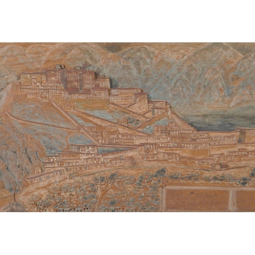 25 - A C19th Tibetan carved teak panel depicting The Potala at Lhasa, the lower right carved with an insc... 