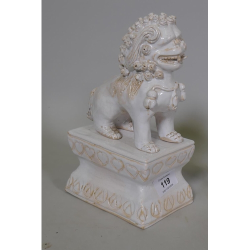 251 - A pair of white glazed terracotta figures of kylin, mounted on pedestals, 23cm high