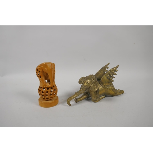 272 - An antique Indian gilt bronze winged elephant, and a carved boxwood elephant, 17cm long