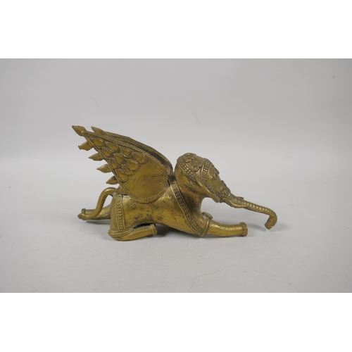 272 - An antique Indian gilt bronze winged elephant, and a carved boxwood elephant, 17cm long