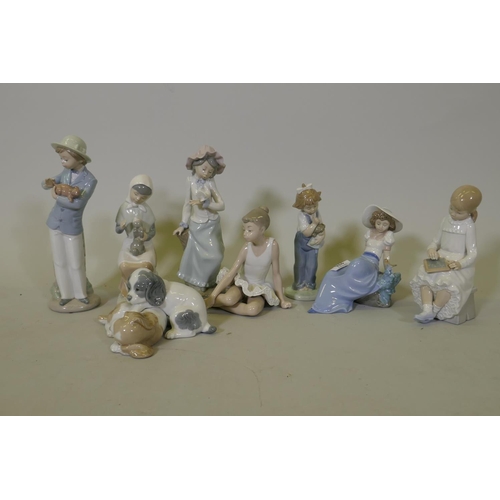 276 - Eight Nao porcelain figures, ballerina, girl with a dove, boy and puppies etc