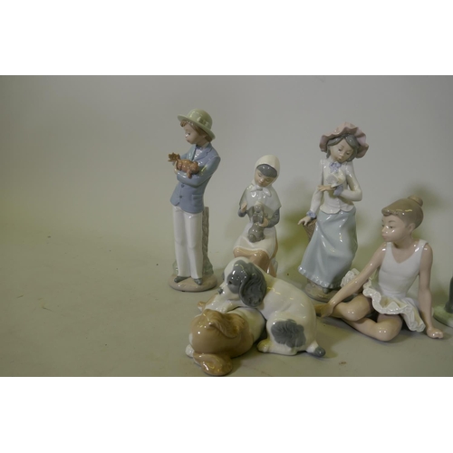 276 - Eight Nao porcelain figures, ballerina, girl with a dove, boy and puppies etc